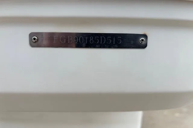 Slide: The Image of 2015 Chaparral 250 Suncoast boat cockpit with steering wheel and control panel. - 24