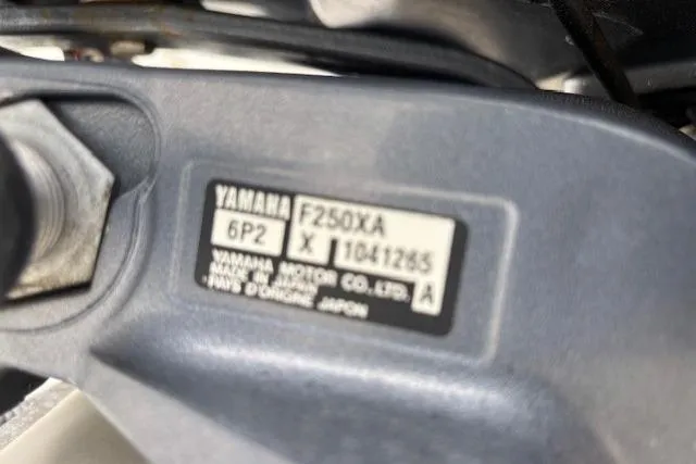 Slide: The Image of Steering console of 2015 Chaparral 250 Suncoast boat with modern controls and gauges. - 25