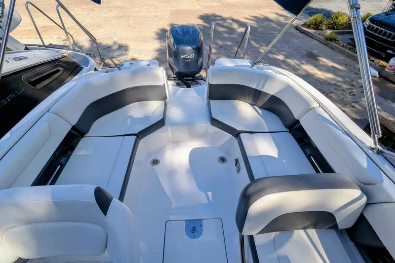 Slide: The Image of 2015 Chaparral 250 Suncoast boat interior with spacious seating and modern design. - 29