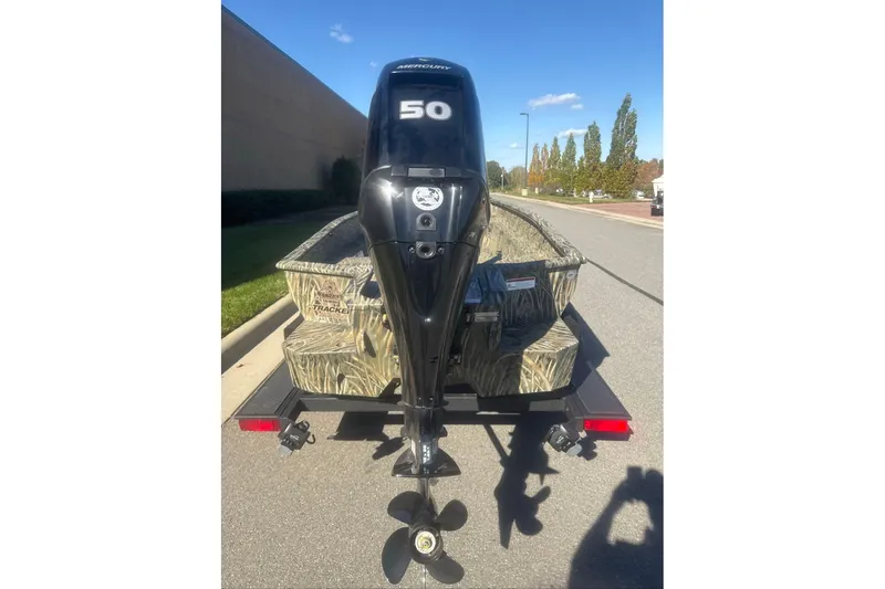 Slide: The Image of 2026 Tracker Grizzly 1650 T Prairie Wings Edition boat with Mercury 50 outboard motor. - 34