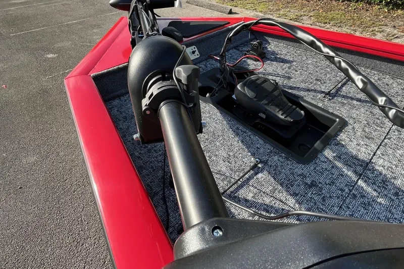 Slide: The Image of 2026 Tracker Pro Team 190 boat deck with trolling motor and red trim. - 58