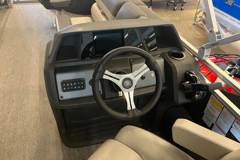 Slide: The Image of Steering console of 2026 Sun Tracker Fishin' Barge 22 DLX pontoon boat. - 7