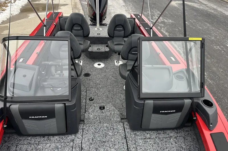 Slide: The Image of 2026 Tracker Targa V-19 Combo boat interior with seating and windshield. - 12