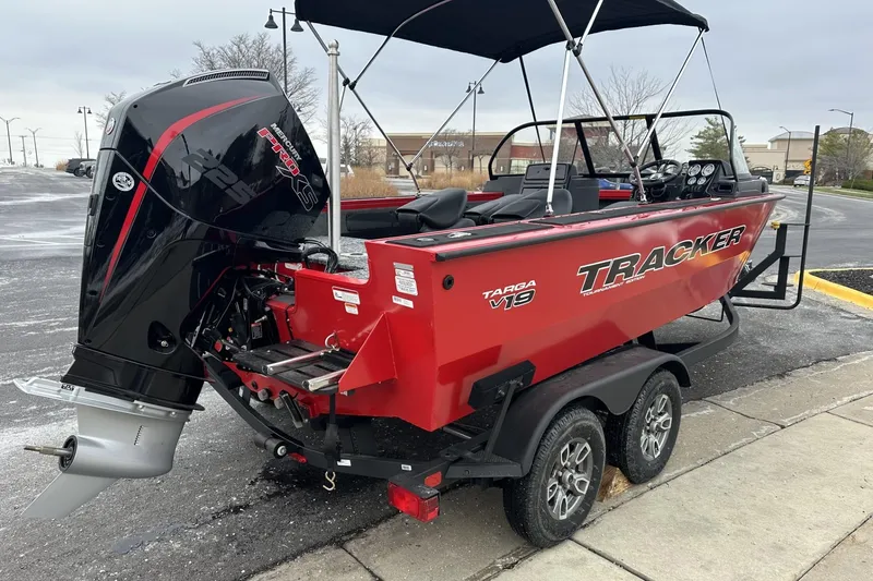 Slide: The Image of 2026 Tracker Targa V-19 Combo boat with Mercury engine on a trailer. - 3