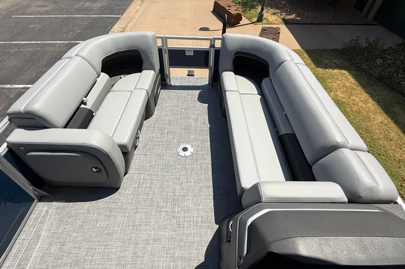 Slide: The Image of Interior of 2026 Sun Tracker SportFish 22 DLX pontoon boat with gray seating. - 15