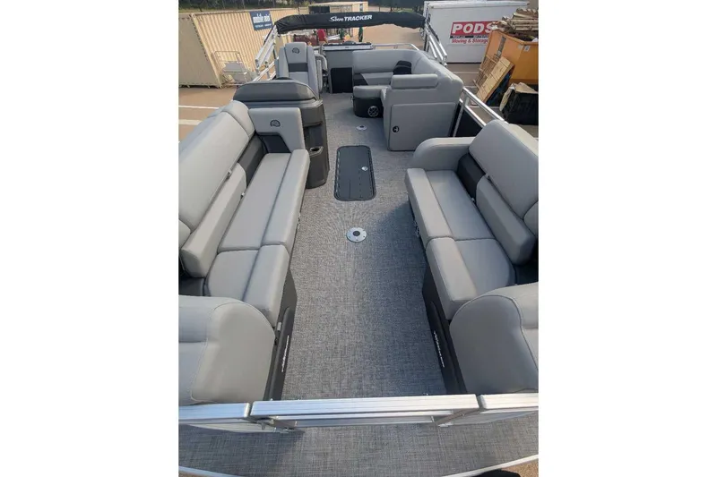 Slide: The Image of 2026 Sun Tracker SportFish 22 XP3 pontoon boat with spacious seating and modern design. - 11