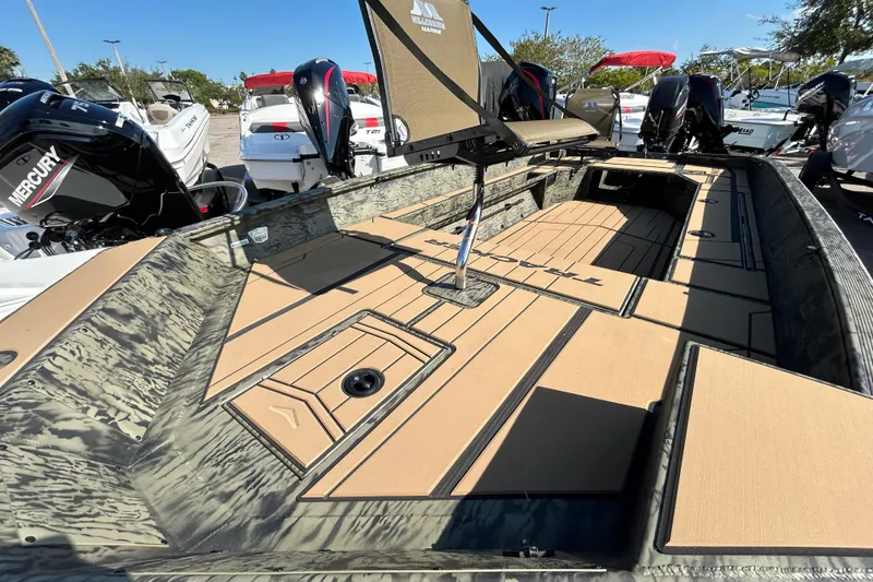 Slide: The Image of 2026 Tracker Grizzly 1756 T Marsh boat with Mercury engines, featuring spacious deck and seating. - 4