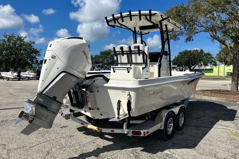 Slide: The Image of 2026 Ranger 2360 Bay boat with Mercury outboard engine on a trailer. - 3