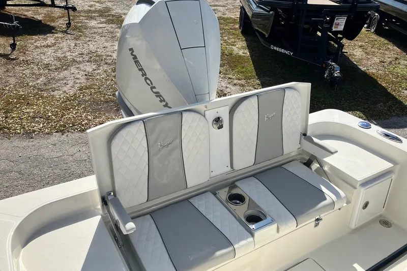 Slide: The Image of 2026 Ranger 2360 Bay boat with Mercury engine and cushioned seating. - 5