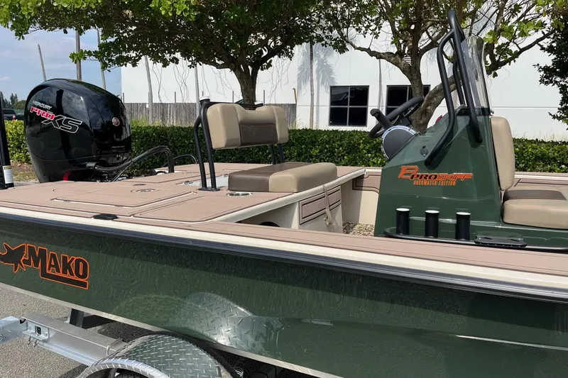 Slide: The Image of 2026 Mako 18 Pro Skiff Backwater Edition boat with Mercury Pro XS engine. - 14
