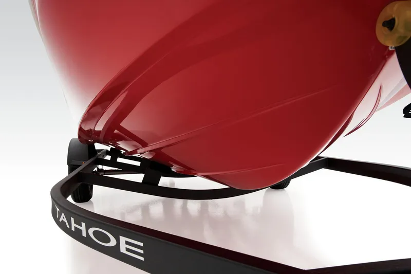 Slide: The Image of 2026 Tahoe T18 boat interior with red and gray seating, steering wheel, and red canopy. - 5