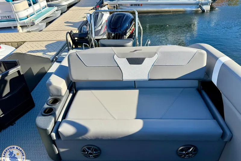 Slide: The Image of ```markdown Luxurious seating on 2026 Evotti 523CS boat with cup holders and speaker system. ``` - 15