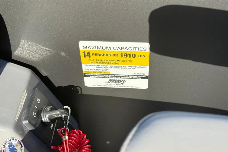 Slide: The Image of Evotti 523CS 2026 boat capacity label, maximum 14 persons or 1910 lbs. - 18