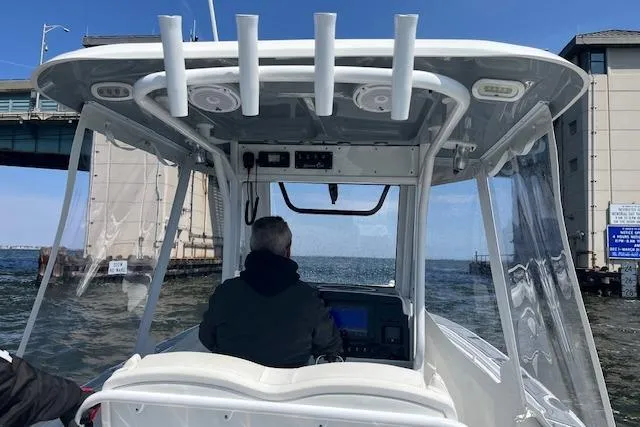 Slide: The Image of 2018 Sea Hunt Gamefish 27 navigating under a bridge on a sunny day. - 19