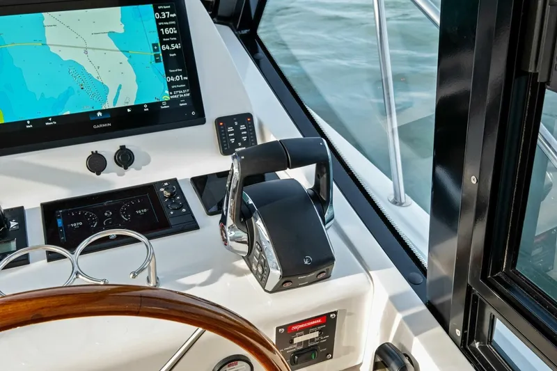 Slide: The Image of Interior view of 2025 MJM 42 yacht with ocean view through windows. - 11