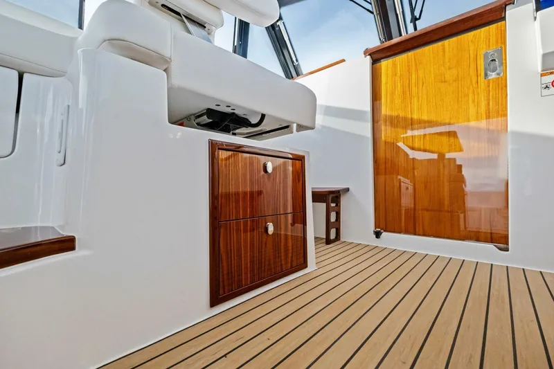 Slide: The Image of Luxurious interior of 2025 MJM 42 yacht with wood paneling and modern amenities. - 18