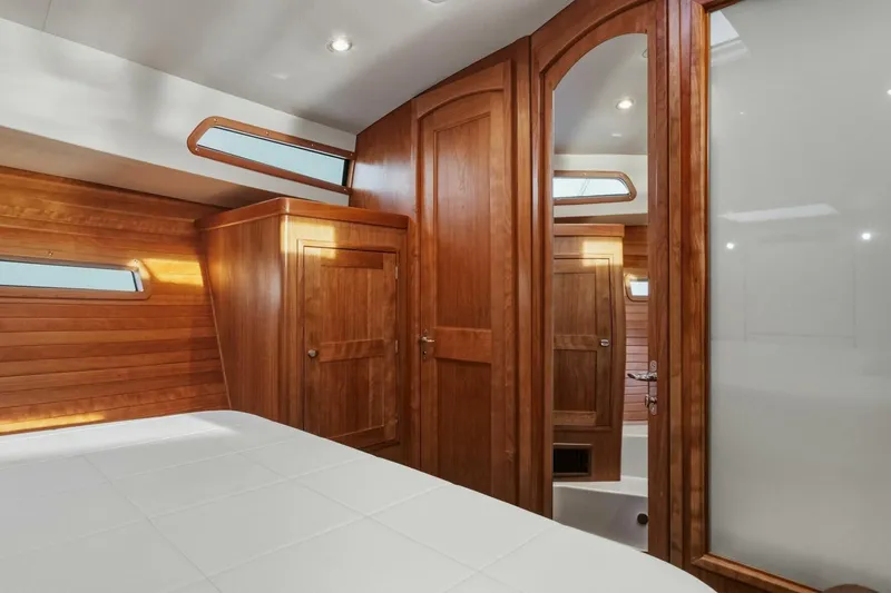 Slide: The Image of Interior of 2025 MJM 42 yacht with wood paneling and control panel. - 21