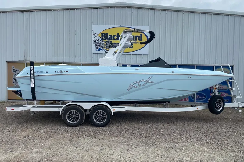 The Image of 2026 ATX Surf Boats 24 Type-S on trailer, displayed at dealership. - 0
