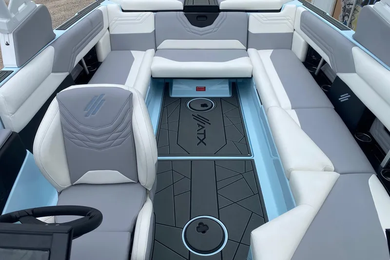 Slide: The Image of Luxurious interior of 2026 ATX Surf Boats 24 Type-S with modern seating and sleek design. - 10