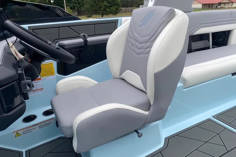 Slide: The Image of Captain's seat in 2026 ATX Surf Boats 24 Type-S, featuring sleek design and modern controls. - 7