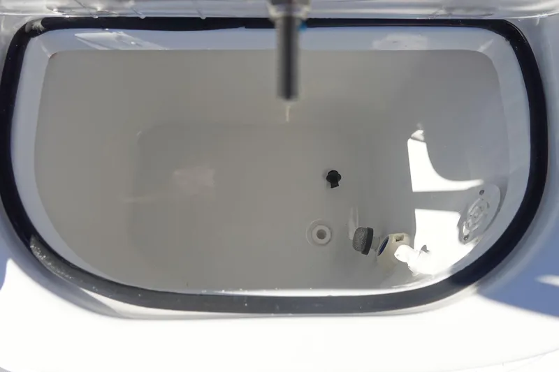 Slide: The Image of T-top view of 2026 Sea Hunt BX 22 BR boat with rod holders and speakers. - 15