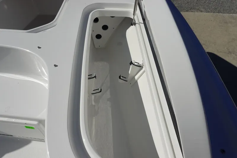 Slide: The Image of Open storage compartment on 2026 Sea Hunt BX 22 BR boat. - 31