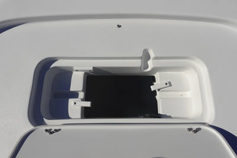 Slide: The Image of Storage compartment of 2026 Sea Hunt BX 22 BR boat, featuring clean interior design. - 33