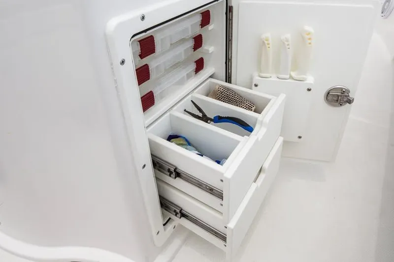 Slide: The Image of Open storage compartment on 2026 Sea Hunt BX 22 BR boat deck. - 8