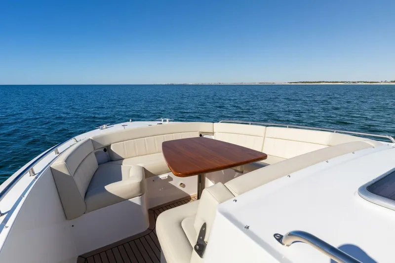 Slide: The Image of Luxury seating area on 2025 MJM 4 yacht, overlooking serene ocean view. - 34