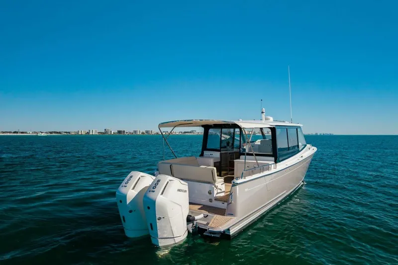 Slide: The Image of Aerial view of 2025 MJM 4 boat with spacious deck and seating area. - 44