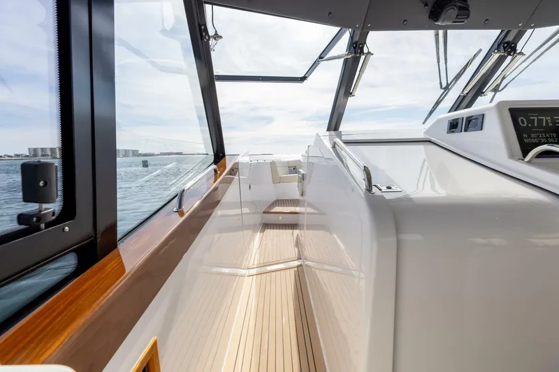 Slide: The Image of Luxurious 2025 MJM 4 yacht interior with spacious seating and ocean view. - 6