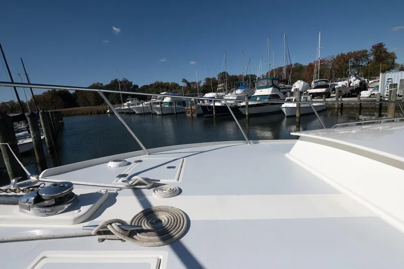 Slide: The Image of Bow view of 2005 Mast & Mallet Thomas Point yacht docked at marina. - 52