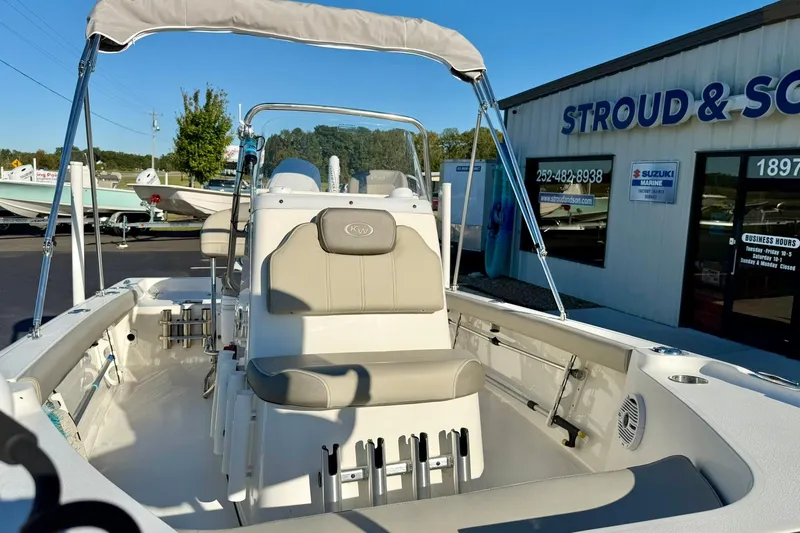 Slide: The Image of 2023 Key West 188 Bay Reef boat at dealership, featuring spacious seating and modern design. - 16