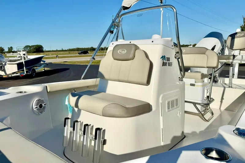 Slide: The Image of 2023 Key West 188 Bay Reef boat interior with seating and rod holders. - 17