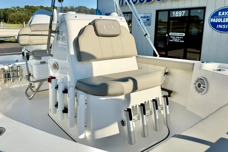 Slide: The Image of 2023 Key West 188 Bay Reef boat interior with seating and rod holders. - 18