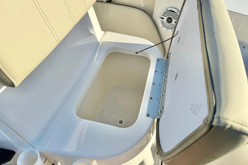 Slide: The Image of 2023 Key West 188 Bay Reef boat seat with storage compartment open. - 20