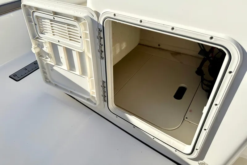 Slide: The Image of Open storage compartment on 2023 Key West 188 Bay Reef boat. - 24