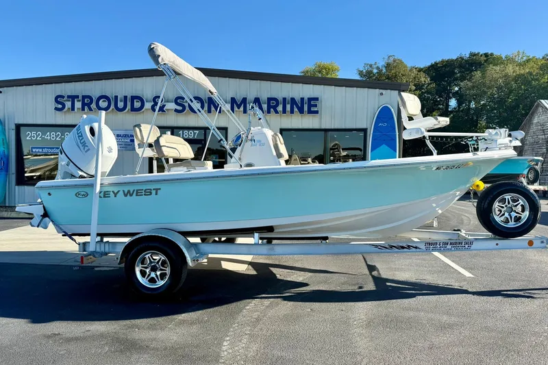 Slide: The Image of 2023 Key West 188 Bay Reef boat on trailer at Stroud & Son Marine dealership. - 6
