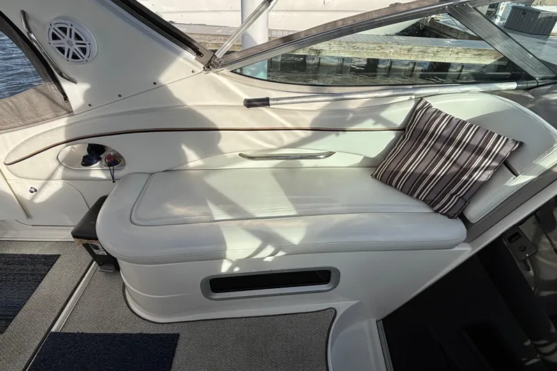 Slide: The Image of 2001 Wellcraft 2800 Martinique boat docked at marina, rear view. - 10