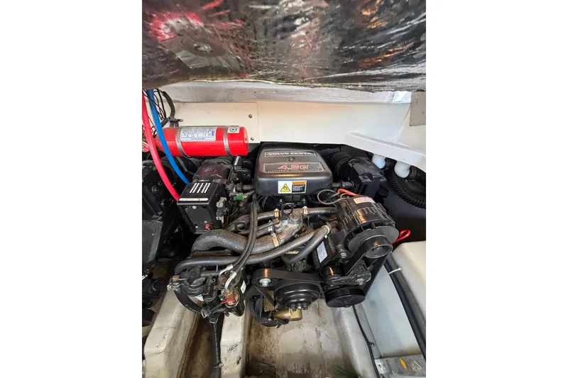 Slide: The Image of Engine compartment of 2001 Wellcraft 2800 Martinique boat, featuring Volvo Penta engine. - 25