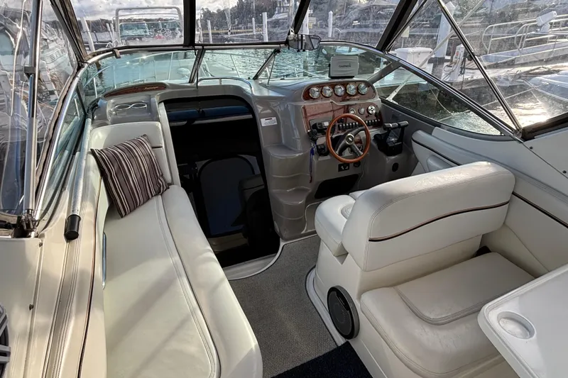 Slide: The Image of 2001 Wellcraft 2800 Martinique boat docked at marina under cloudy sky. - 7