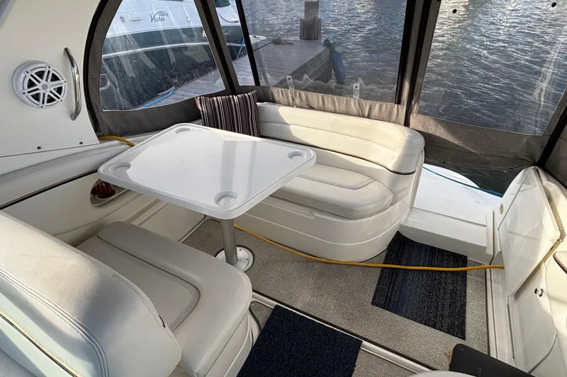 Slide: The Image of Bow of 2001 Wellcraft 2800 Martinique boat with railing and spotlight. - 9