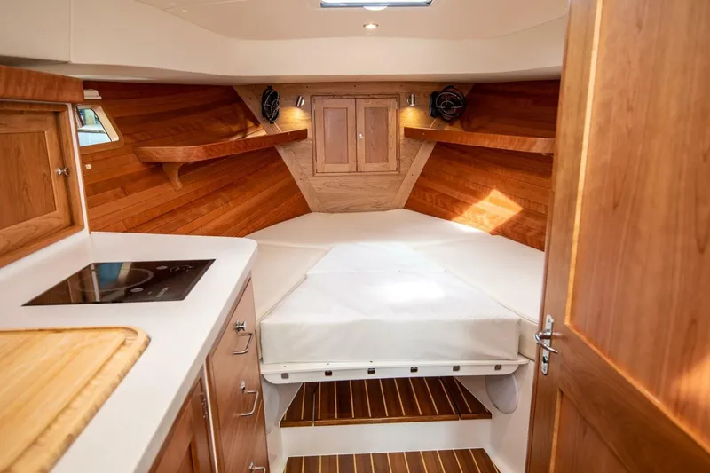 Slide: The Image of Luxurious interior of 2025 MJM 35 yacht with wood accents and modern amenities. - 4
