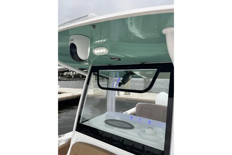 Slide: The Image of 2023 Sea Hunt Ultra 305 SE boat interior with modern features and sleek design. - 21