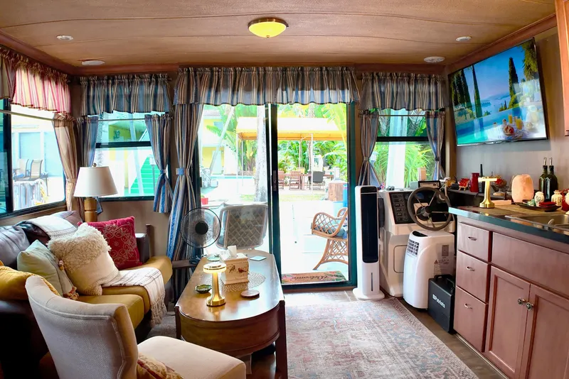 Slide: The Image of Interior of 1996 Catamaran Cruisers Aqua Cruiser 44, featuring cozy living space and modern amenities. - 14