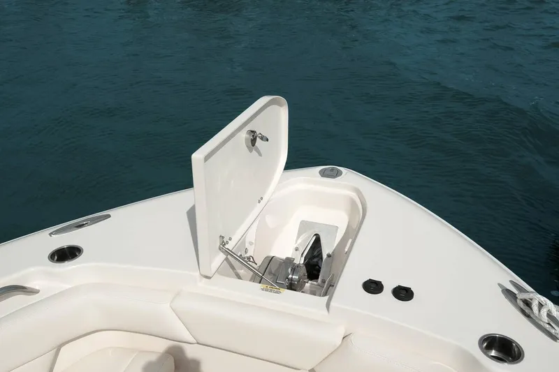 Slide: The Image of Manufacturer Provided Image: 2020 Grady-White Canyon 271 boat anchor locker open on calm water. - 37