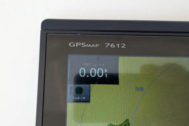 Slide: The Image of GPSMAP 7612 display showing 0.00 knots speed on American Tug 435, 2015 model. - 18