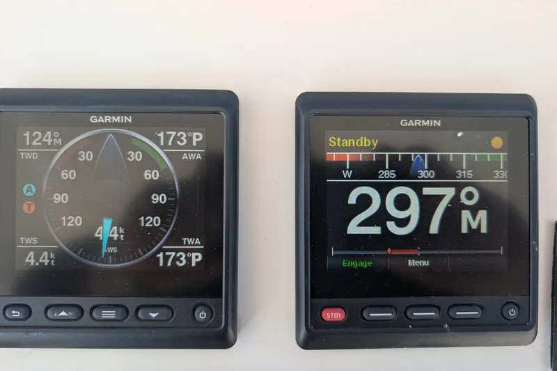 Slide: The Image of Garmin navigation displays on a 2015 American Tug 435, showing wind and heading data. - 19