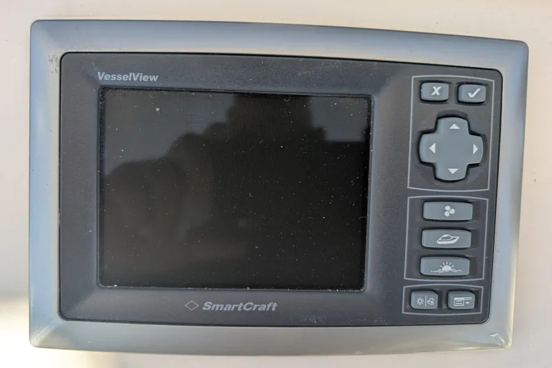 Slide: The Image of SmartCraft VesselView display on 2015 American Tug 435 boat dashboard. - 21