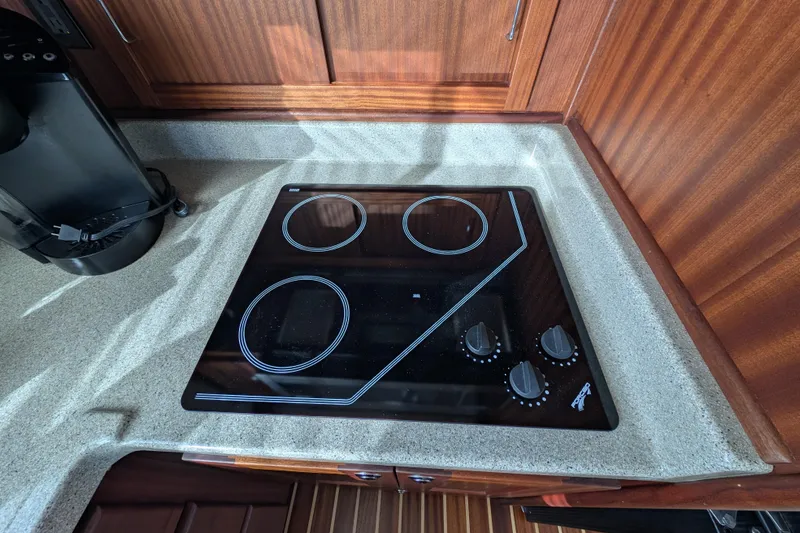 Slide: The Image of Modern kitchen stove in 2015 American Tug 435 boat galley. - 39